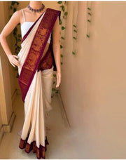 White Color With Dark Maroon Soft Lichi Silk Sarees With Price and Online Shopping Price Under 1000 . this fabric So Heavy Saree and Expertly made with Lichi Silk and JACQUARD WORK, this 6.3 length Saree from Uma Soft is accompanied by a matching blouse.