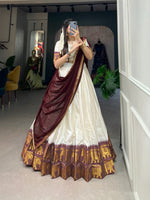 Load image into Gallery viewer, Fully stitched Zari Cotton Dhavani Set featuring jacquard lehenga with canvas reinforcement and zip closure. Includes unstitched 1m blouse fabric. Available in multiple sizes (XS to XXL) with 5m+ flair, full inner lining, and 2m+ Organza dupatta with lace. Showcases authentic Zari weaving work in four color options.

