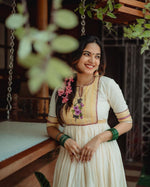 Load image into Gallery viewer, White Or Off-White Gold Chanderi Tissue Gowns For Weddings and God Puja Best Wear Collection Price and Online Shopping Price Under 1500 . This Fabric So Heavy and Best Smooth Fabric and Zari Weaving Work and Top Side Round Neck and Flower Design Work , this Fabric Most Famous and Soft Fabric , Traditional Look For 2024-25 , 2025-26 .  
