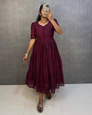 Exclusive wine Hakoba cotton mini gown with rich flair , Wine color 3-layered frock gown in cotton fabric , 
Partywear wine short gown with crepe lining and pocket , Elegant wine cotton dress with Hakoba work .