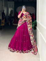 Load image into Gallery viewer, Stay on Saree-Point! With a 4-meter flair, you&#39;ll be draped to perfection in this Vichitra Silk half-saree. The accompanying Kalamkari print dupatta adds a rustic touch, and the compact size means it can go with you anywhere. The blouse features intricate sequins and thread embroidery work that gives you a touch of sparkle. Traditional clothing crafted for today&#39;s fashion-forward woman.

