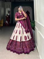 Load image into Gallery viewer, Wine Tussar silk lehenga with handcrafted drawstring closure , Elegant wine color ethnic lehenga for bridal and party wear , Premium wine lehenga with can-can and micro cotton lining , Bandhej printed wine lehenga with zari lace and tassel dupatta , Wine color wedding special lehenga with traditional touch . 

