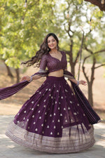 Load image into Gallery viewer, half saree set features a fully stitched lehenga made from faux blooming fabric with heavy sequins and thread embroidery, offering a 3.5-meter flair and zip with dori latkan closure. The unstitched blouse piece matches the lehenga’s fabric and embroidery, measuring 1 meter
