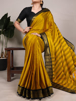 Load image into Gallery viewer, Sunshine yellow silk saree in aura fabric , Yellow zari weaving saree for haldi and functions , Bright yellow aura silk saree with classic border , Festive wear yellow silk saree with zari detailing , Yellow saree with matching blouse piece included . 
