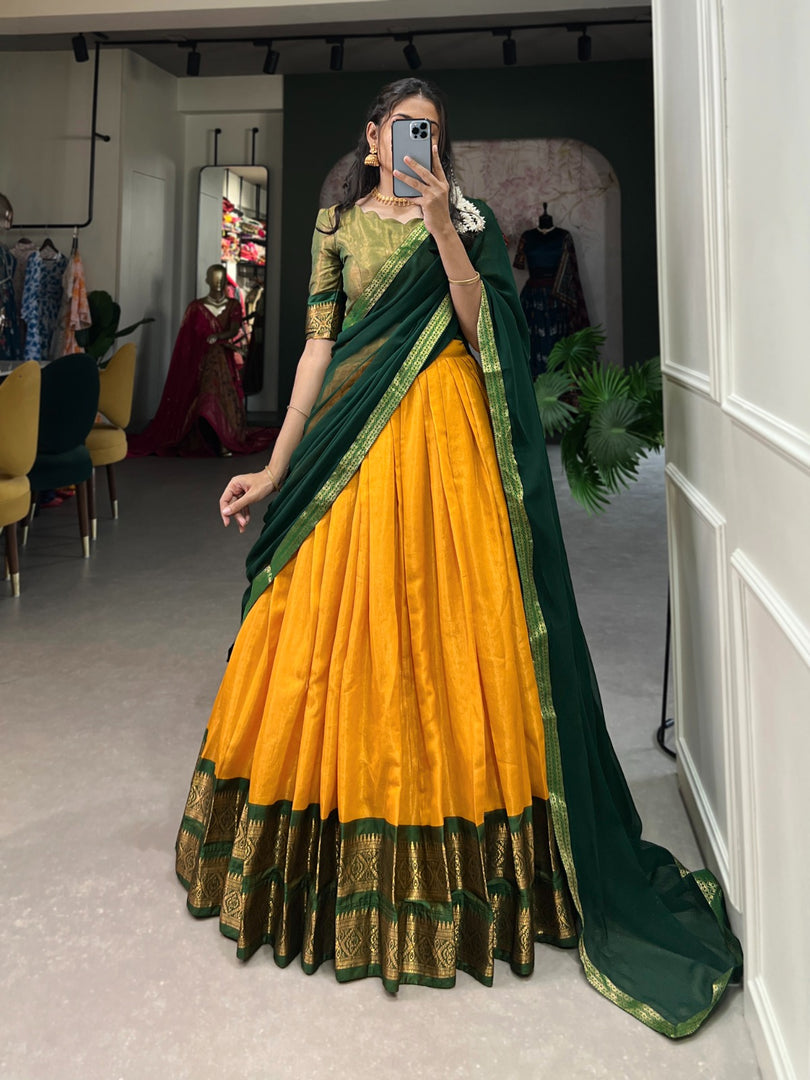 Expertly crafted with traditional Narayan pet cotton fabric and intricately woven with zari, this full stitched Kanchipuram Langa Voni set is the ideal choice for any special occasion. 
