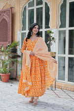 Load image into Gallery viewer, Riyanshi Pure Cotton Anarkali features a 52-inch top with half cotton lining, full sleeves, and fancy V-neck. Includes 40-inch elastic-waist bottom and 2 meter dupatta. All pieces crafted from pure cotton.


