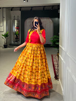 Load image into Gallery viewer, Yellow Dola Silk Gown With Price and Best Online Shopping Price Under 1500 . this Fabric Yellow Dola Silk Patola Paithani Print With Foil work in Gown and So Premium Fabric and RIch Design . This Design Fabric Dola Silk  Micro Cotton Lining. this Model Using crafted RIch Border Zari Weaving Work and Suit Koti Design This Peacock Design Traditional Look 2024-25 . 
