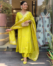 Yellow Heavy Roman Silk Yellow Color Kurti Price and Online Shopping Price Under 1500 . this Fabric Rich Border and Step into sophistication with this Heavy Roman Silk Kurti Set. Embroidered details, luxurious fabric, and a complete 3-piece ensemble make it ideal for any occasion .