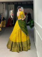 Load image into Gallery viewer, Stitched Kanjivaram lehenga with zari weaving, fits up to 42&quot; waist, 3.80m flair. Includes 1m Kanjivaram blouse fabric and 2.5m georgette dupatta with sequins embroidery. Complete set with drawstring, zip closure, and micro cotton inner lining.
