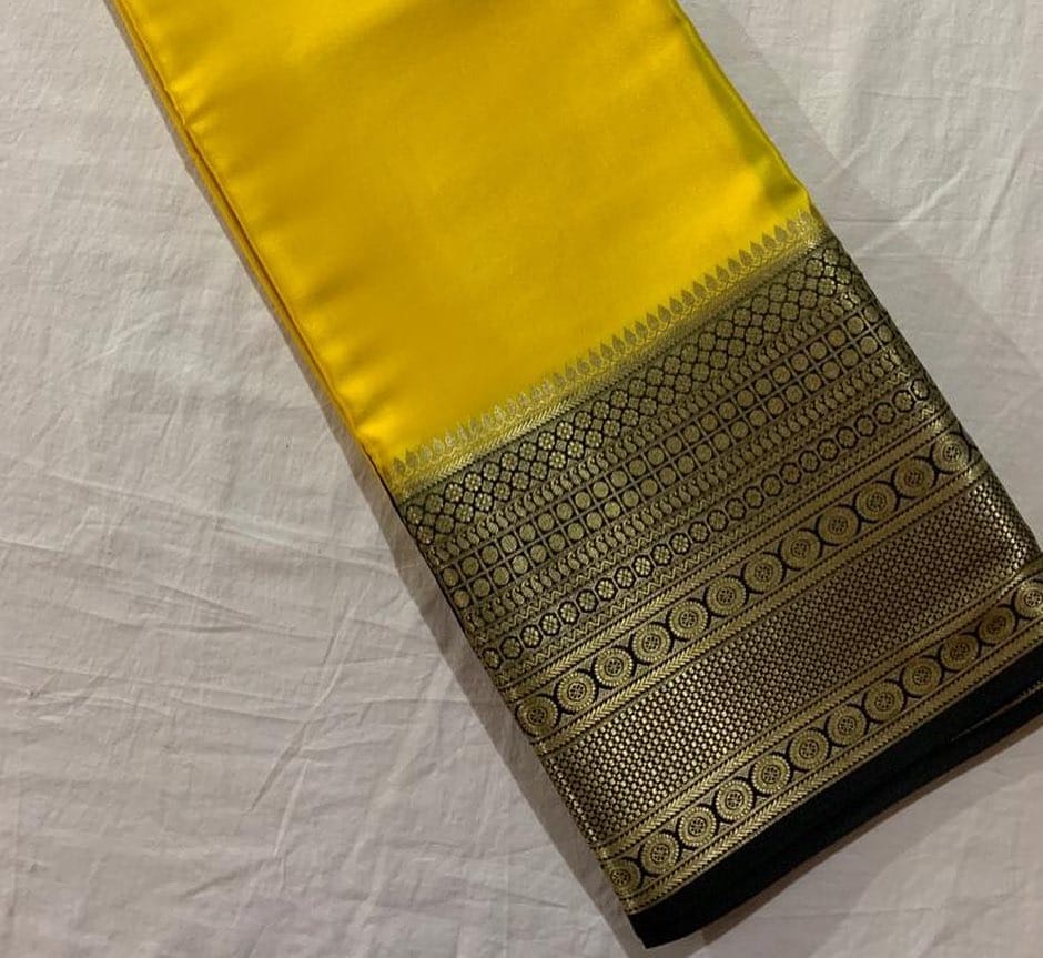 Pure Yellow Semi-Mysore Silk Sarees price and online . Exclusive Yellow Saree With Black pattu GOld Zari Weaving Super Look  And Authentic look Best Popular , Famous. 